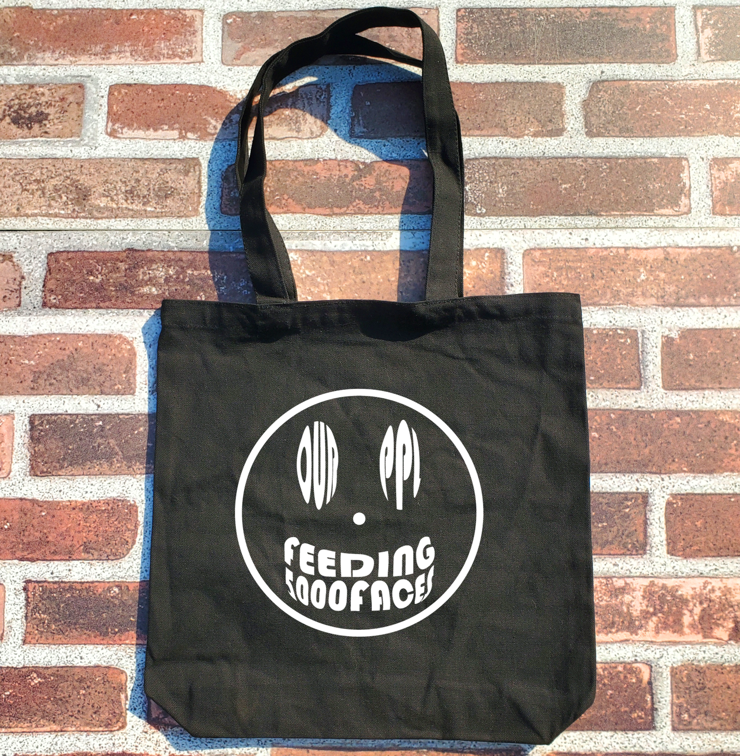 Feeding 5,000 Faces Tote Bag